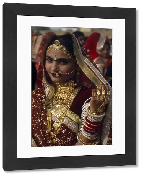 INDIA, Rajasthan, Jaisalmer Portrait of a Miss Desert contestant wearing traditional