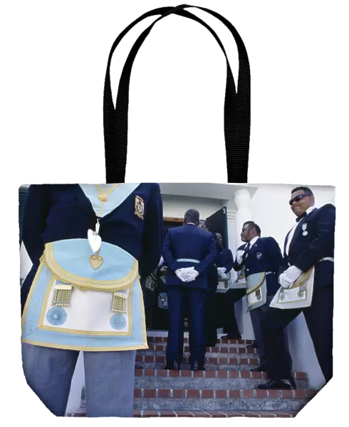 BERMUDA, St Georges Cropped view of freemasons wearing regalia for the Peppercorn