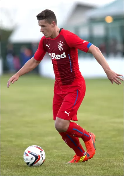 Rangers Fraser Aird in Thrilling Action against Buckie Thistle during Pre-Season Friendly at Victoria Park