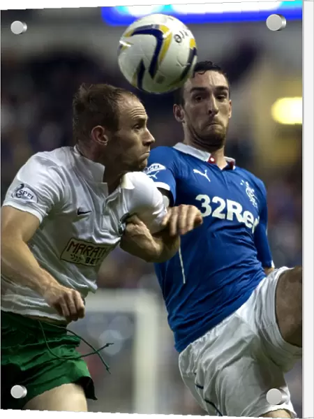 Intense Rivalry: Lee Wallace Stands Firm Against David Gray at Ibrox Stadium - SPFL Championship Clash