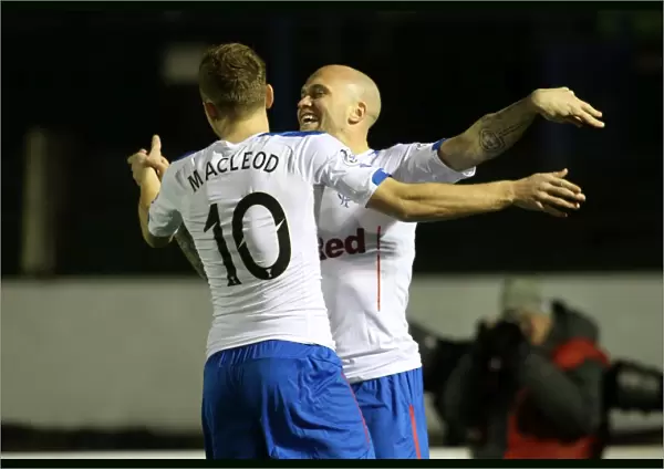 Rangers Football Club: Celebrating a Goal in Scottish Championship by Nicky Law and Lewis Macleod