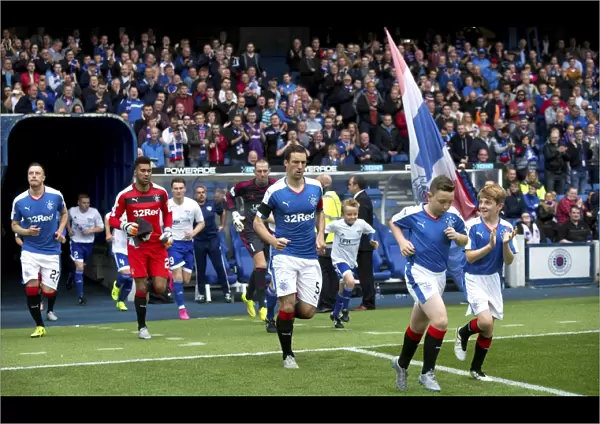 Rangers Captain Lee Wallace Kicks Off League Cup Tie against Peterhead with Mascots at Ibrox Stadium