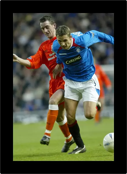 Rangers Triumph: 2-1 Victory Over Dundee United - December 6, 2003