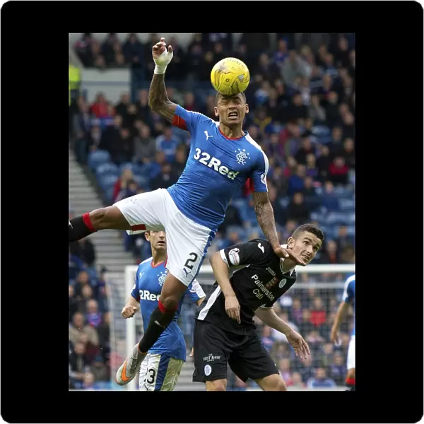 Soaring High: An Epic Heading Moment by Rangers James Tavernier at Ibrox Stadium