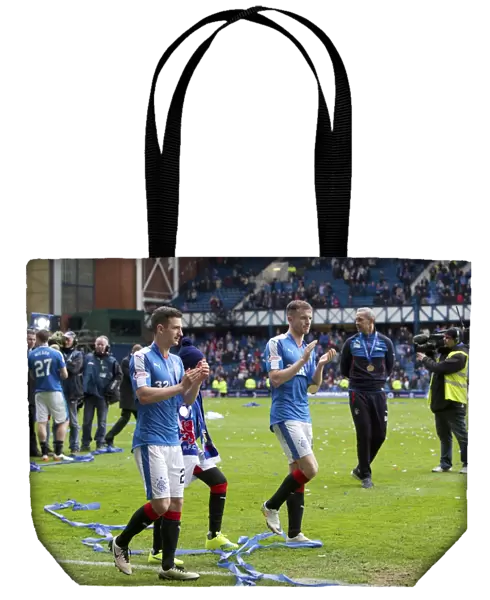 Champions League Bound: Euphoric Celebration of Rangers Holt and Halliday with the Scottish Championship Trophy