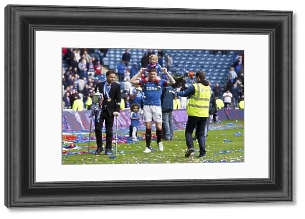 Rangers Football Club: Harry Forrester and Rob Kiernan Celebrate Championship Victory with the Ladbrokes Trophy at Ibrox Stadium