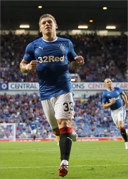 Rangers Martyn Waghorn: Celebrating Glory with a Goal in the Betfred Cup Match against Annan Athletic at Ibrox Stadium