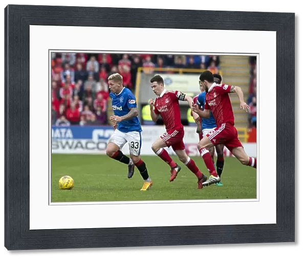 Martyn Waghorn Charges Forward in Intense Rangers vs. Aberdeen Clash at Pittodrie Stadium