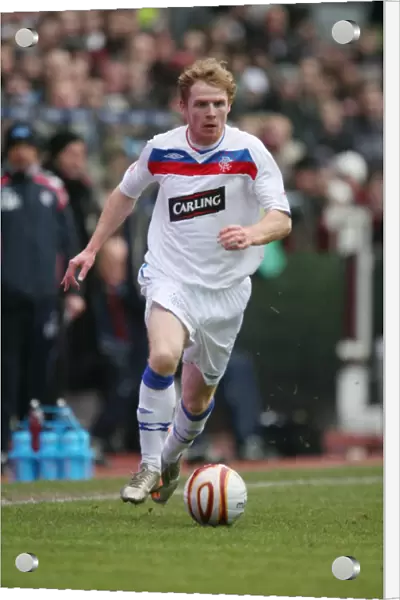 Chris Burke in Action: Heart of Midlothian vs Rangers, Clydesdale Bank Premier League (08-09), Tynecastle