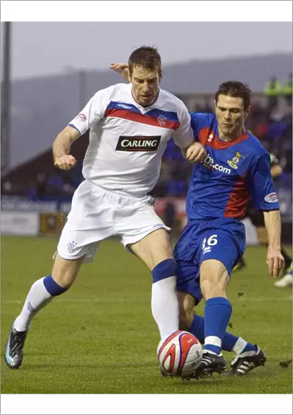 Rangers Kirk Broadfoot Tackled by Inverness Richard Hastings in Clydesdale Bank Premier League Match (Rangers 3-0 Inverness)