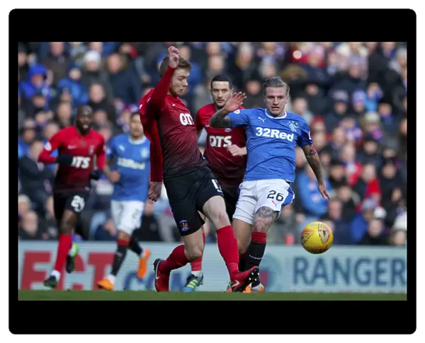 Rangers vs Kilmarnock: Jason Cummings Battles for the Ball at Ibrox Stadium