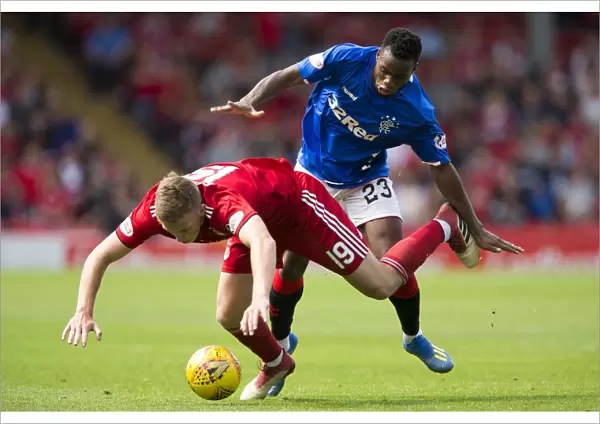 Intense Rangers-Aberdeen Clash: Coulibaly Fouls Ferguson