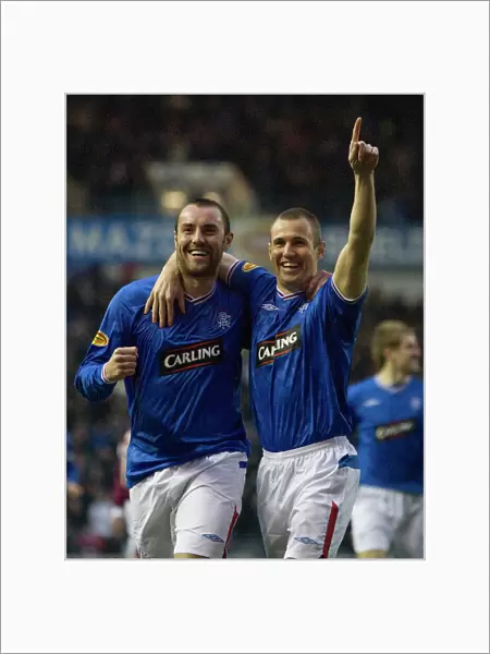 Rangers Kris Boyd and Kenny Miller: Unstoppable Duo Celebrates 3-0 Victory over St. Johnstone at Ibrox