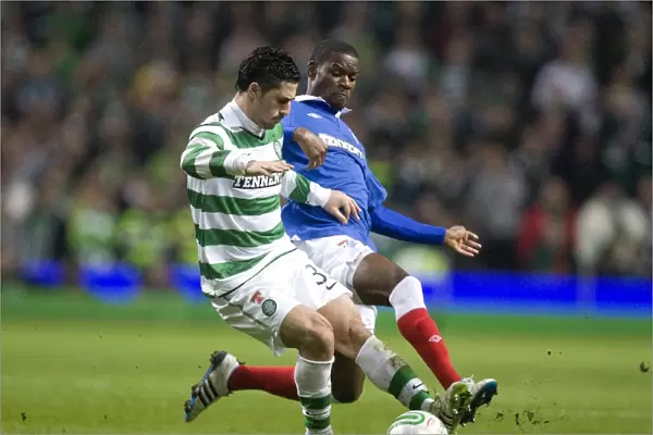 Maurice Edu vs. Beram Kayal: A Football Battle in the Scottish Cup Fifth Round Replay - Celtic Leads 1-0