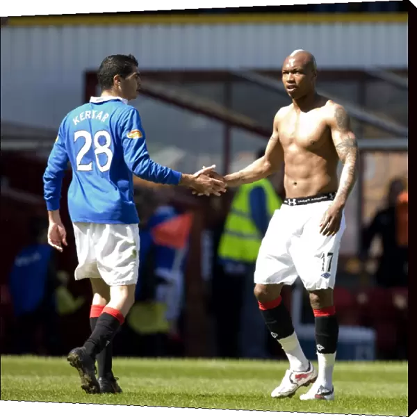 Rangers Kerkar and Diouf: Celebrating a 5-0 Victory Over Motherwell