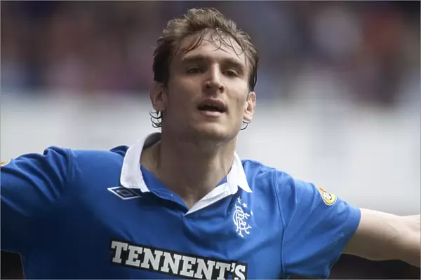 Rangers Jelavic Scores First Goal in Impressive 4-0 Win Over Heart of Midlothian (Clydesdale Bank Scottish Premier League, Ibrox Stadium)