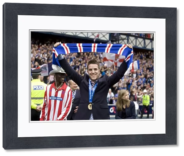 Rangers Football Club: Andrew Little's Triumphant Moment - Celebrating the SPL Championship Win (2010-11) at Ibrox Stadium