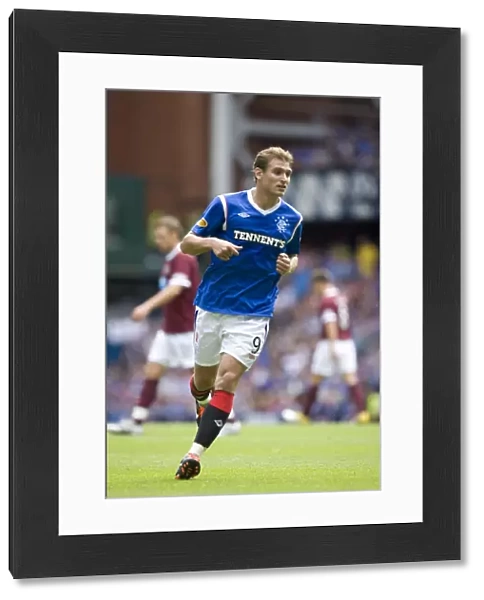 Thrilling 1-1 Stalemate at Ibrox: Jelavic's Dramatic Equalizer for Rangers vs Hearts (Scottish Premier League)