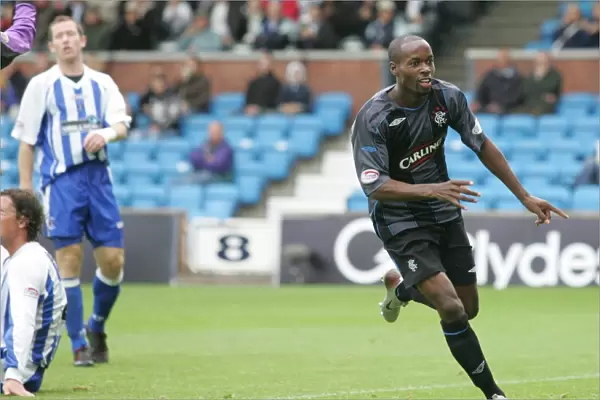 Rangers DaMarcus Beasley: Celebrating His Opening Goal Against Kilmarnock (2-1) in the Clydesdale Bank Premier League