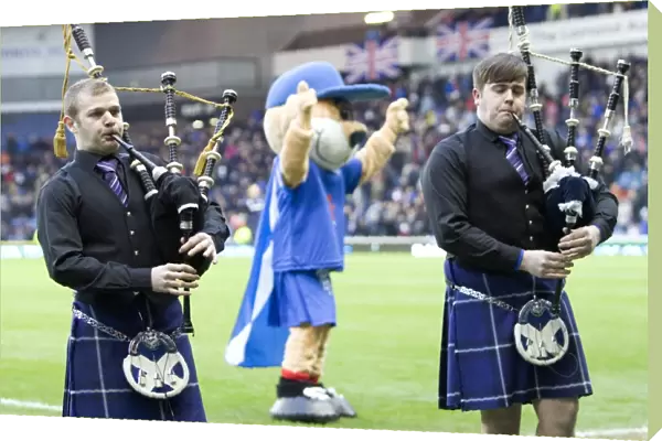 Rangers Triumphant Half Time: Drums and Roses Celebrate a 4-0 Victory over Hibernian at Ibrox Stadium