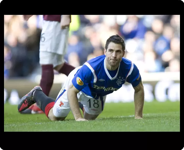 Rangers vs Hearts: Carlos Bocanegra's Heartbreaking Goal (1-2) in the Clydesdale Bank Scottish Premier League Clash at Ibrox Stadium