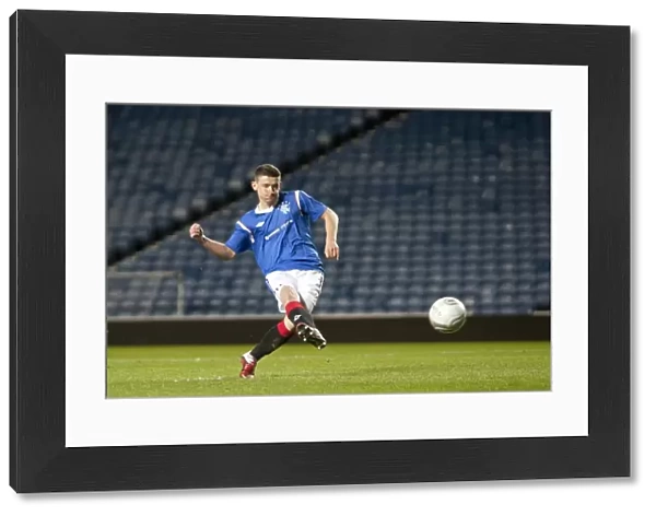 Fraser Aird Scores the Decisive Penalty: Thrilling Glasgow Cup Final Shootout between Rangers U17s and Celtic U17s at Ibrox Stadium (2012)