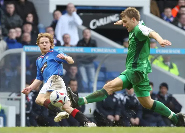 Chris Burke vs Chris Hogg: Intense Clash in the Scottish Cup Fifth Round Replay between Rangers and Hibernian (1-0)