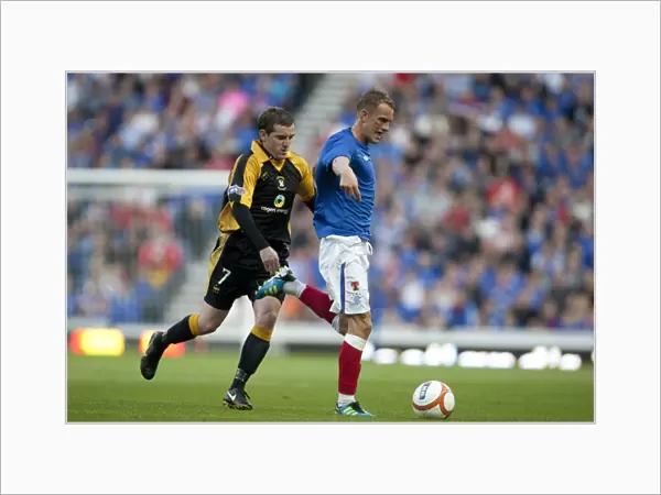 Rangers 4-0 East Fife: Dean Shiels vs Craig Johnstone - A Clash in the Scottish Communities League Cup at Ibrox Stadium