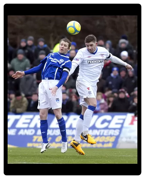 Rangers Kyle Hutton Outjumps Scott McLaughlin: Peterhead 0-1 Rangers, Irn-Bru Scottish Third Division, Balmoor Stadium