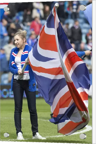 Rangers Flag Bearers Celebrate 2-0 Victory Over Clyde at Ibrox Stadium