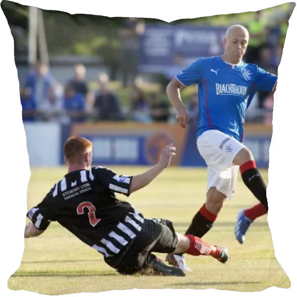 Rangers Nicky Law Scores the Opener: Rangers Take the Lead Against Elgin City