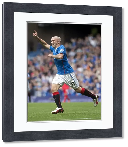 Rangers Nicky Law: Exulting in a 4-1 Victory Over Brechin City at Ibrox Stadium (SPFL League 1)