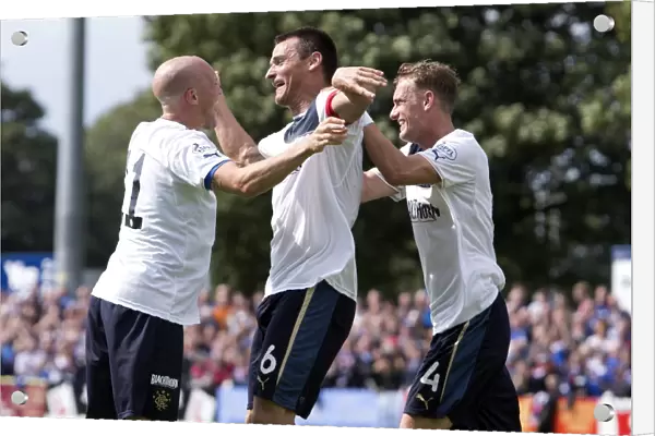 Rangers Triumph: Lee McCulloch and Team Mates Celebrate Three Goals in Scottish League One (Stranraer 0-3 Rangers)