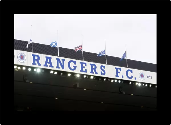 Half-Masted Flags at Ibrox Stadium: A Tribute to Rangers Football Club's 2003 Scottish Cup Victory