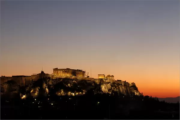 The Acropolis hill is seen during sunset in Athens