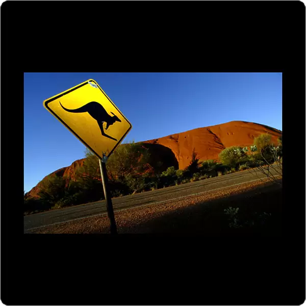 PHOTO TAKEN 20APR04- A road sign near Uluru (Ayers Rock), about 350 kilometres (220