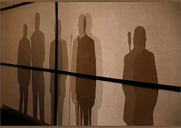 Members of the Lima Group cast their shadows during a meeting in Santiago