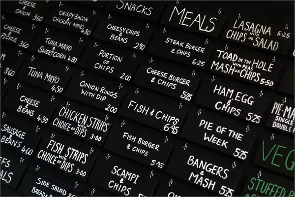 The menu board is seen inside the Little Driver pub in east London
