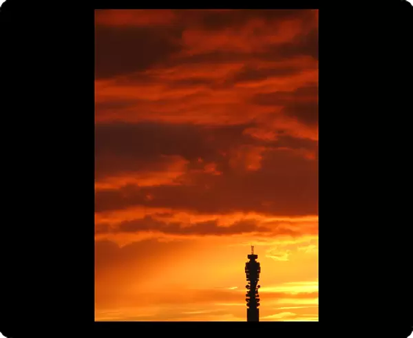 The British Telecom tower is seen silhouetted at dusk in central London
