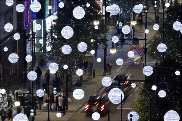 Oxford Street is illuminated after singer Cheryl Fernandez-Versini switched on the