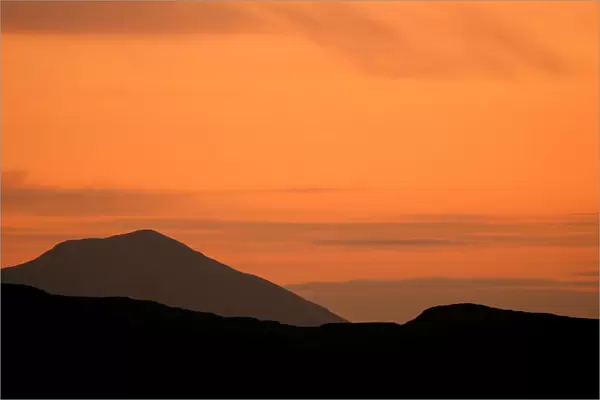 Schiehallion mountain is viewed from Moulin Moor at dusk, Pitlochry, Scotland
