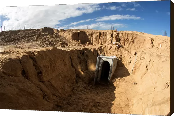 An entrance to what the Israeli military say is a cross-border attack tunnel dug