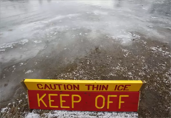 A thin ice warning is posted at Whites Pond in Concord, New Hampshire