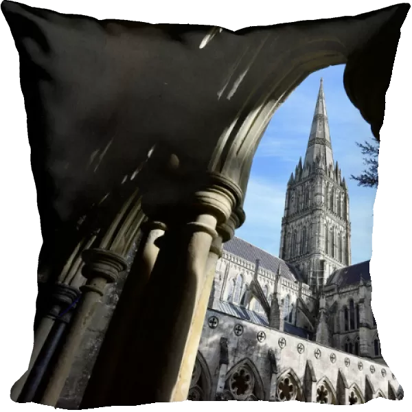 Salisbury Cathedral is seen through the arches of its cloisters