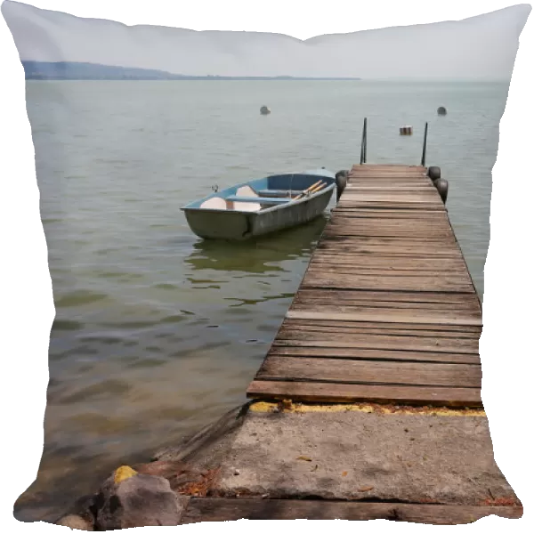 Boat is seen tied to a jetty on Lake Balaton in Keszthely