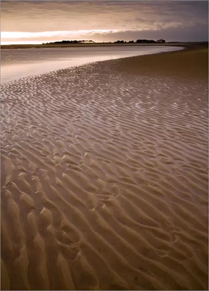 View of sandy beach at sunset, Holkham Bay, Norfolk, England, august