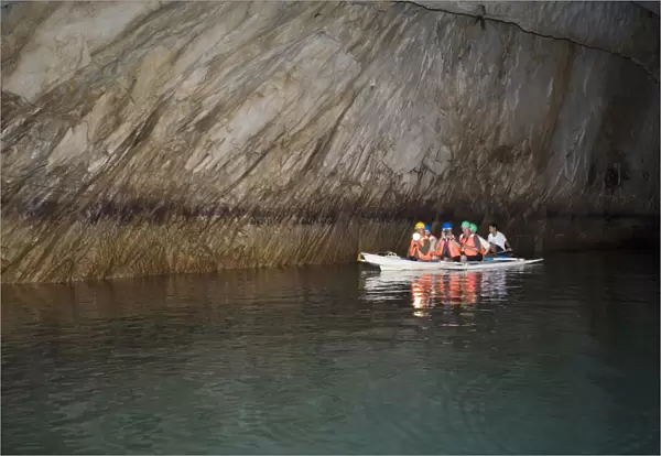 Tourist boat in cave on subterranean river, Puerto Princesa Subterranean River N. P