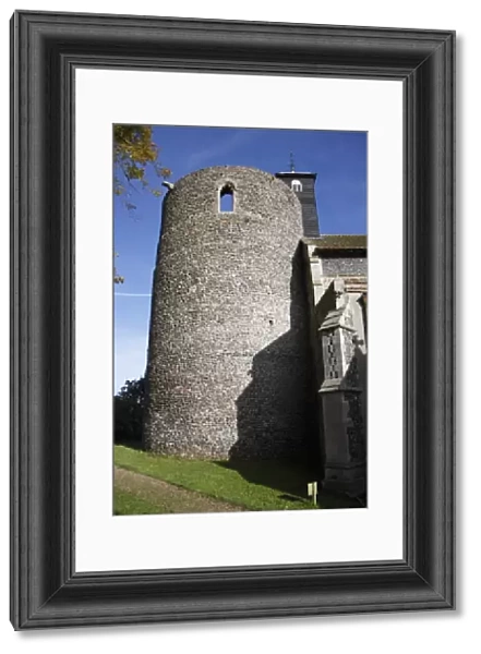 View of church with Norman round-tower, largest Norman round-tower in country, St