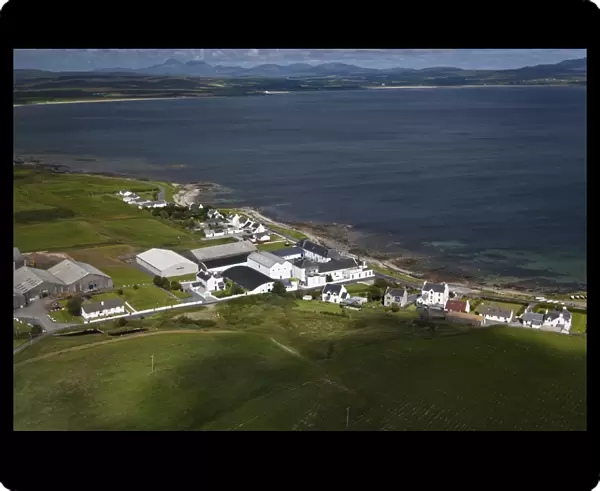 Aerial view of coastline with village and whisky distillery, Bunnahabhain Distillery, Loch Indaal, Rinns of Islay