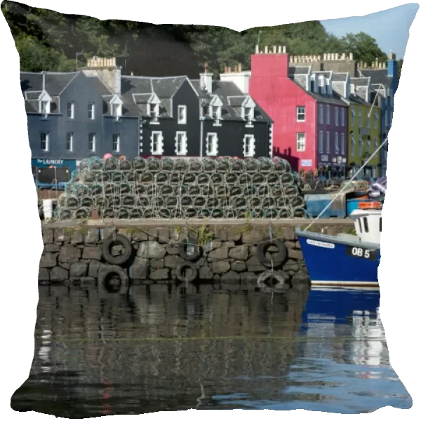 View of lobster pots and fishing boat at harbour of coastal town, Tobermory, Isle of Mull, Inner Hebrides, Scotland